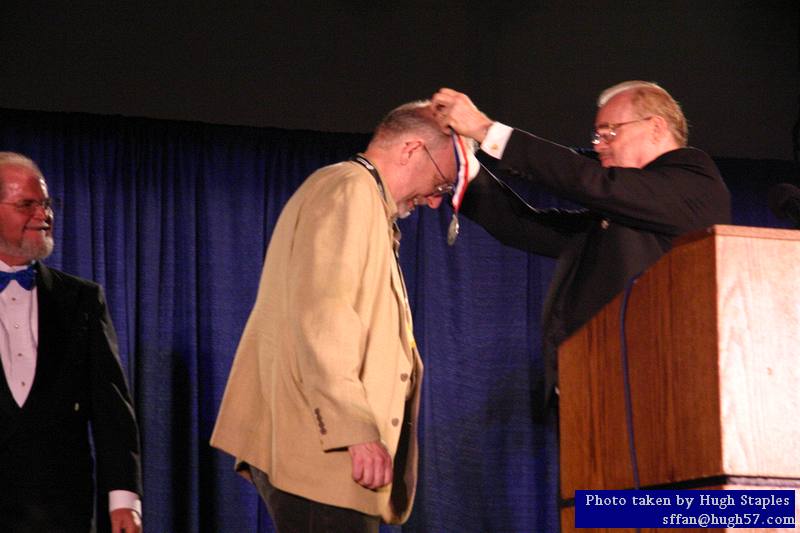 Larry Niven and Jerry Pournelle present the Robert A. Heinlein Award to author Greg Bear