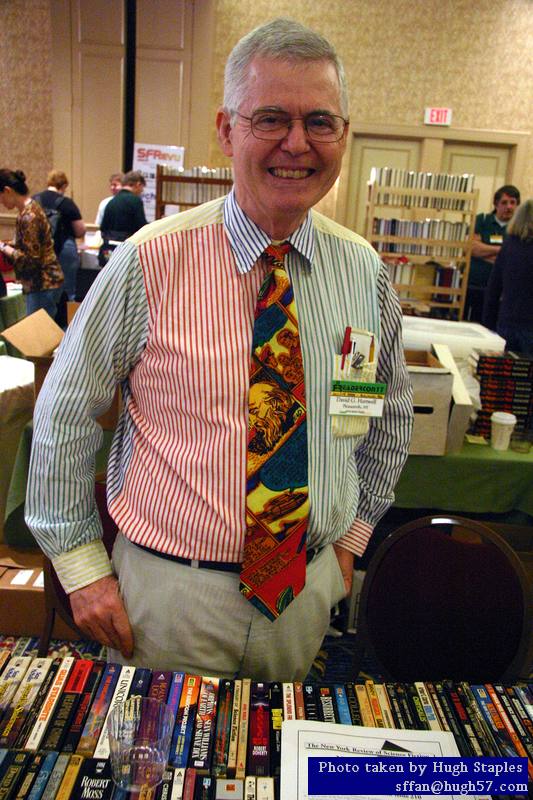Tor editor David Hartwell works a bookstore table