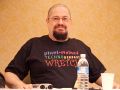 Charlie Stross shows of his t-shirt made in honor of<br />International Pixel-Stained Technopeasant Day